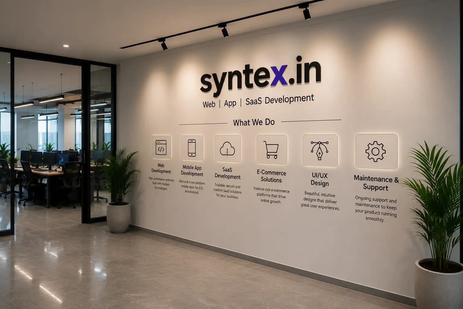 The services wall at the Fiverr office, listing web, mobile app, SaaS, e-commerce, UI/UX and maintenance work
